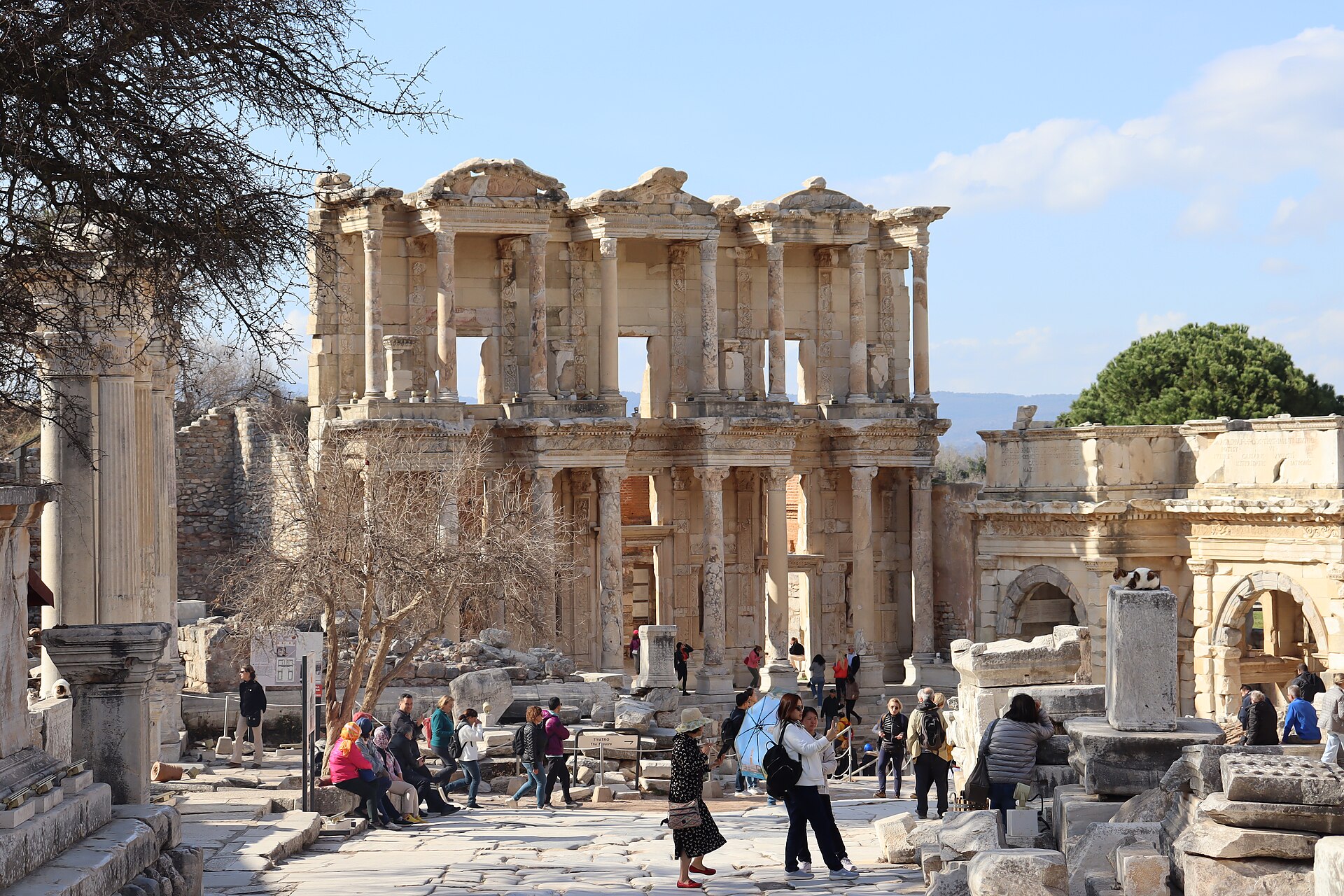 The restored facade of the Library of Celsus at Ephesus seen along the marble street